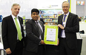 Sanjeev Kumar of Zircon received the first HD Screening certification from Carsten Knudsen of Esko with Jan Buchweitz of Esko to his right at drupa in Dusseldorf